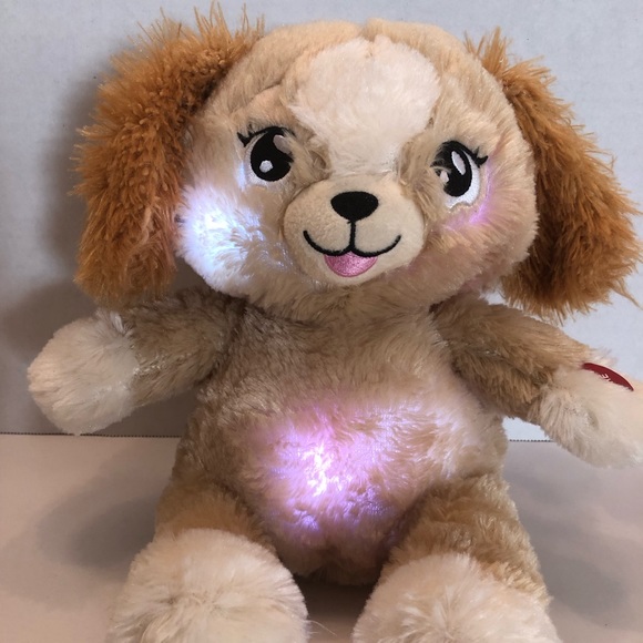 Lullabrites puppy plush plays 3 songs for bedtime. Changes to different lights. - Picture 1 of 9